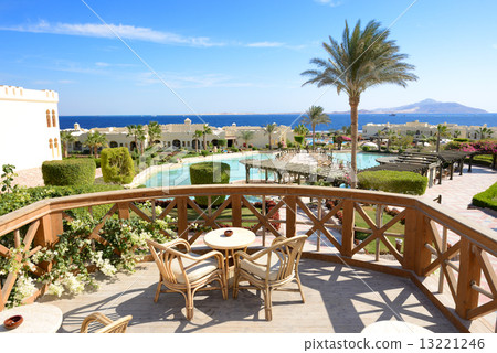 The view on swimming pool near outdoor restaurant at luxury hote The view on swimming pool near outdoor restaurant at luxury hote 13221246