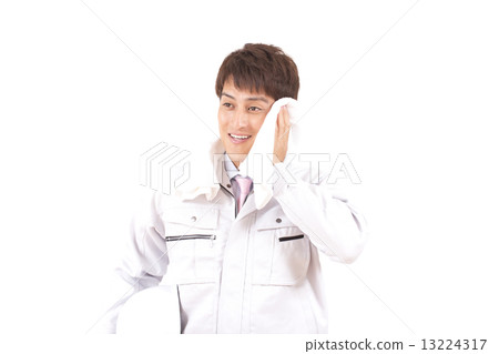 Young workers wiping sweat Young workers wiping sweat 13224317