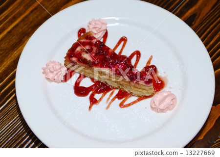 sweet berry pie on white plate 13227669