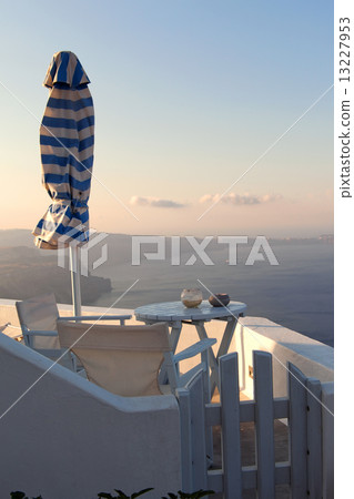 Table overlooking the sea Table overlooking the sea 13227953