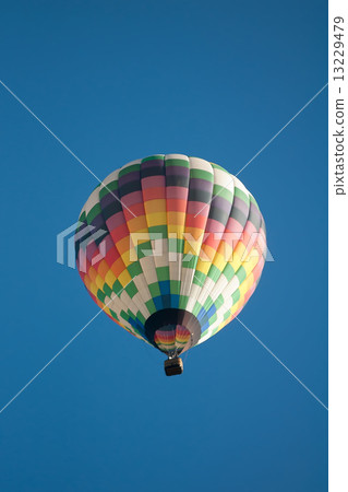 hot air balloon over farm land 13229479
