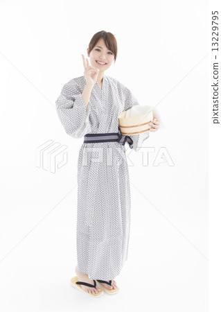 A cute woman wearing a yukata on a hot spring trip A cute woman wearing a yukata on a hot spring trip 13229795