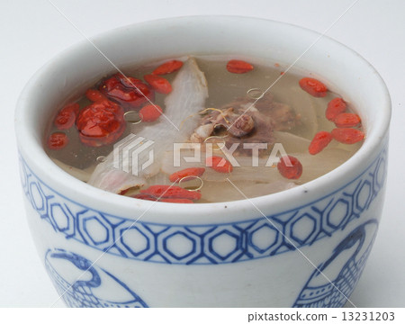 Chicken and herb soup in pot, Chinese food style. Chicken and herb soup in pot, Chinese food style. 13231203
