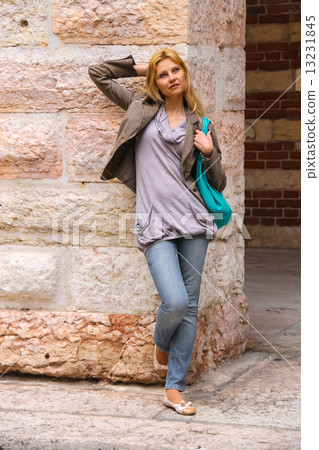 Attractive girl in courtyard  the Palazzo della Ragione in Veron 13231845