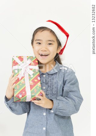 A girl with a Christmas gift 13232682