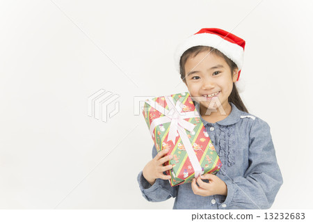 A girl with a Christmas gift 13232683