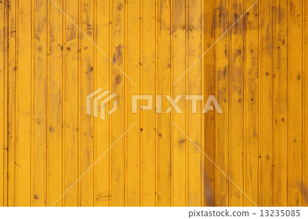 Yellow wall made of wooden boards 13235085