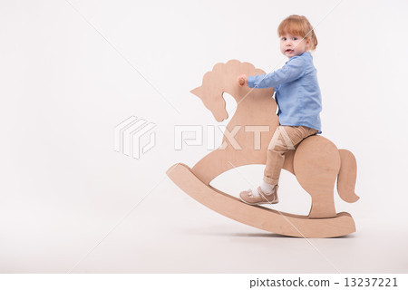 Child with the toy horse 13237221