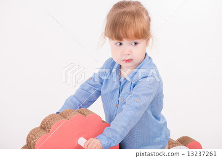 Child with the toy horse Child with the toy horse 13237261
