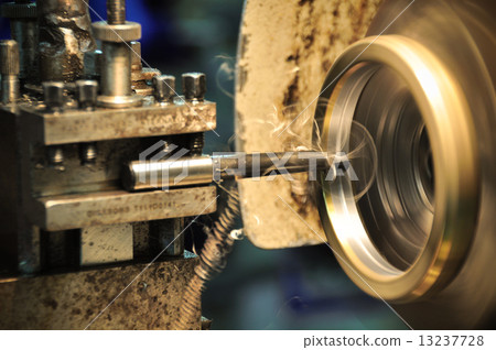 lathe machine in a workshop, Part of the lathe. Lathe machine is operation on the work shop. 13237728