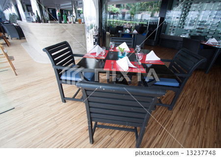 restaurant seats and tables near the river, restaurant interior 13237748