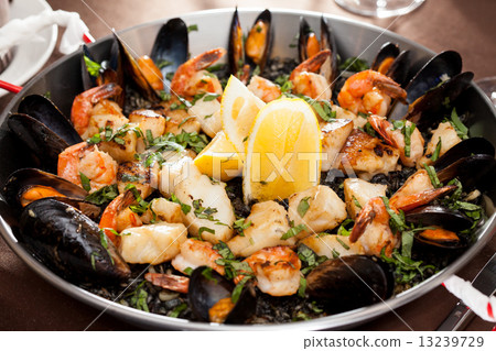 seafood paella in the fry pan seafood paella in the fry pan 13239729
