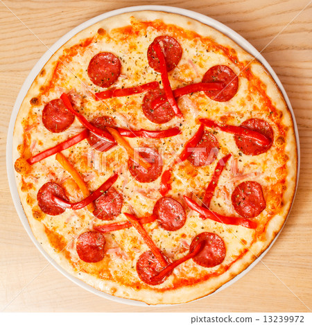 图库照片 salami pizza on a wooden table