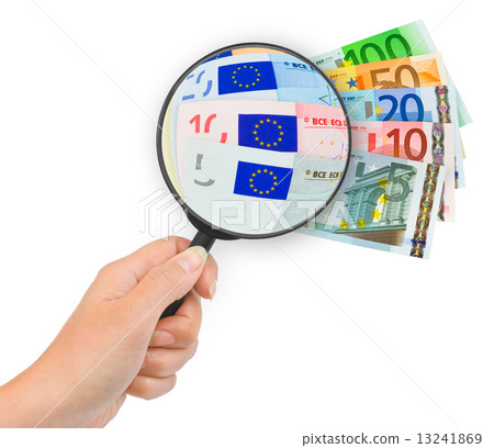 Hand with magnifying glass and money 13241869