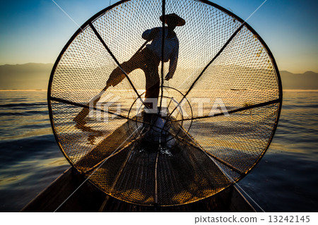 Silhouette fishermen in Inle Lake at sunrise, Shan State, Myanma Silhouette fishermen in Inle Lake at sunrise, Shan State, Myanma 13242145