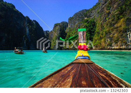 Traditional longtail boat in Maya bay on Koh Phi Phi Leh Island, Traditional longtail boat in Maya bay on Koh Phi Phi Leh Island, 13242303