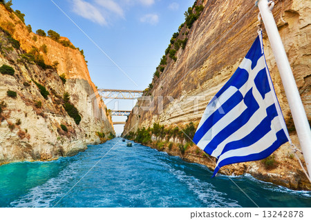 Corinth channel in Greece and greek flag on ship Corinth channel in Greece and greek flag on ship 13242878
