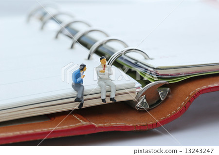 A notebook and a businessman 13243247