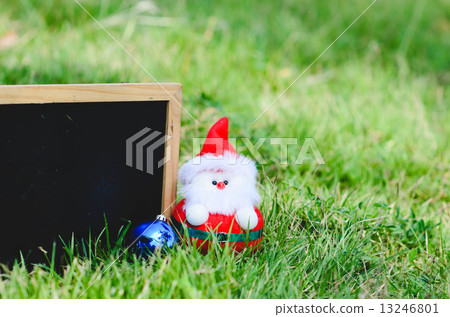 Blank blackboard with Santa doll. Blank blackboard with Santa doll. 13246801
