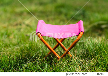 Folding camping stool in the park outdoor with day light. 13246968