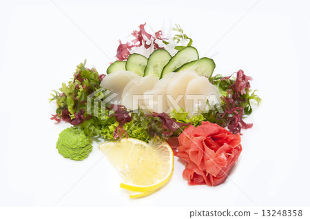 Japanese cuisine sashimi with vegetables and fish in a restaurant 13248358