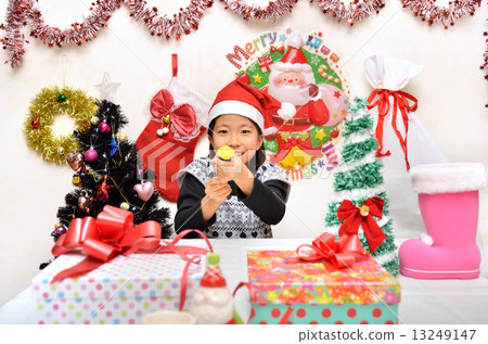 Santa Claus costume girls ringing crackers Santa Claus costume girls ringing crackers 13249147