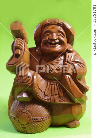 Stock Photo: the god of wealth, daikokuten, woodcarving