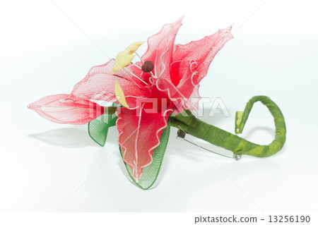 Plastic flower isolated on white background 13256190