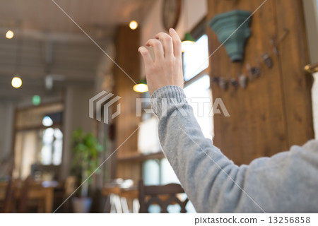 A customer calling a clerk 13256858