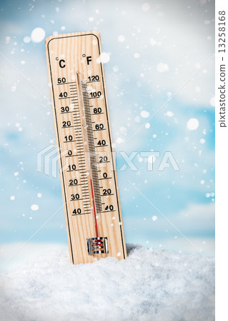 Thermometer on snow shows low temperatures 13258168
