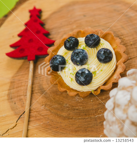 Traditional Christmas cake. Warm colors. 13258543