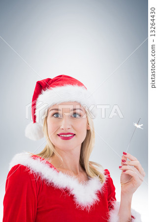 Festive blonde smiling at camera 13264430