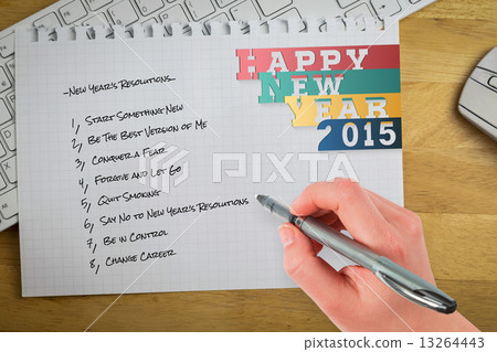 Composite image of businesswomans hand writing with pen Composite image of businesswomans hand writing with pen 13264443