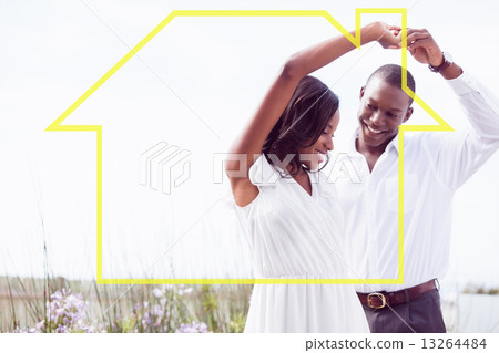 Composite image of romantic couple dancing and smiling 13264484