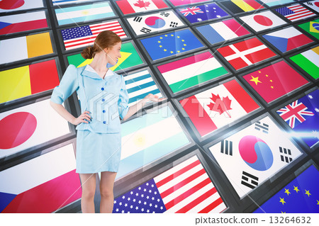 Composite image of pretty air hostess presenting with hand 13264632