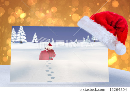 Composite image of santa delivery presents to village Composite image of santa delivery presents to village 13264804
