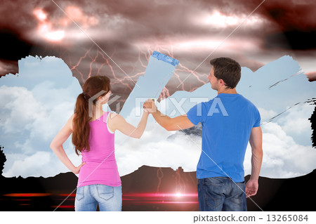 Composite image of couple painting together Composite image of couple painting together 13265084