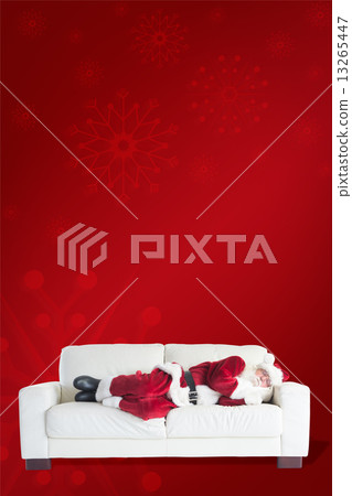 Composite image of father christmas sleeps on a couch Composite image of father christmas sleeps on a couch 13265447