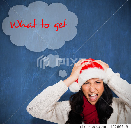 Composite image of irritated woman looking at camera 13266549