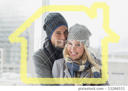 Composite image of cute couple in warm clothing smiling at camer Composite image of cute couple in warm clothing smiling at camer 13266551
