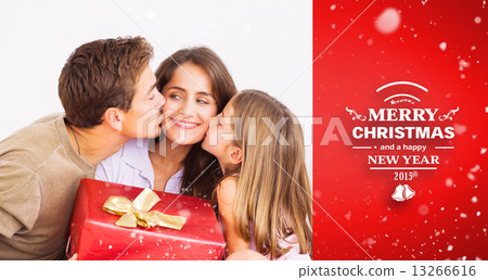 Composite image of father and his daughter offering a red gift 13266616