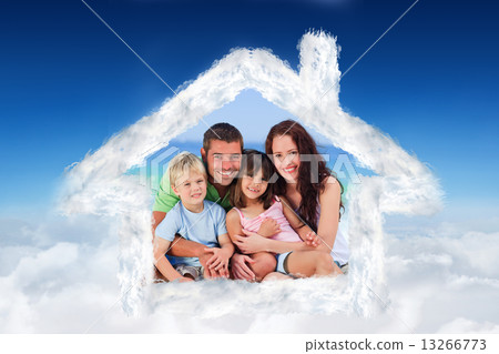Composite image of portrait of a family at the beach 13266773