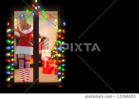 Composite image of rear view of sexy santa girl Composite image of rear view of sexy santa girl 13266853