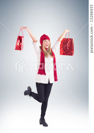 Pretty blonde carrying shopping bags Pretty blonde carrying shopping bags 13266935