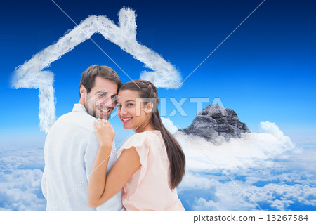 Composite image of attractive young couple smiling at camera Composite image of attractive young couple smiling at camera 13267584