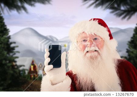 Composite image of santa claus shows a smartphone Composite image of santa claus shows a smartphone 13267670