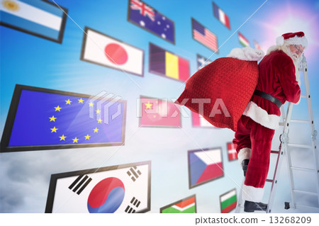 Composite image of santa steps up a ladder 13268209
