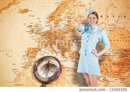 Composite image of pretty air hostess with hand on hip 13268389