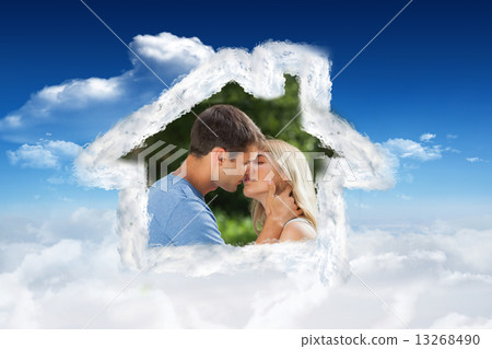 Composite image of loving couple kissing passionately Composite image of loving couple kissing passionately 13268490