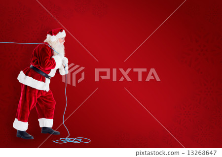 Composite image of santa pushes a shopping cart Composite image of santa pushes a shopping cart 13268647